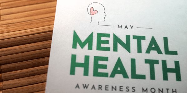 sign announcing May is Mental Health Awareness Month